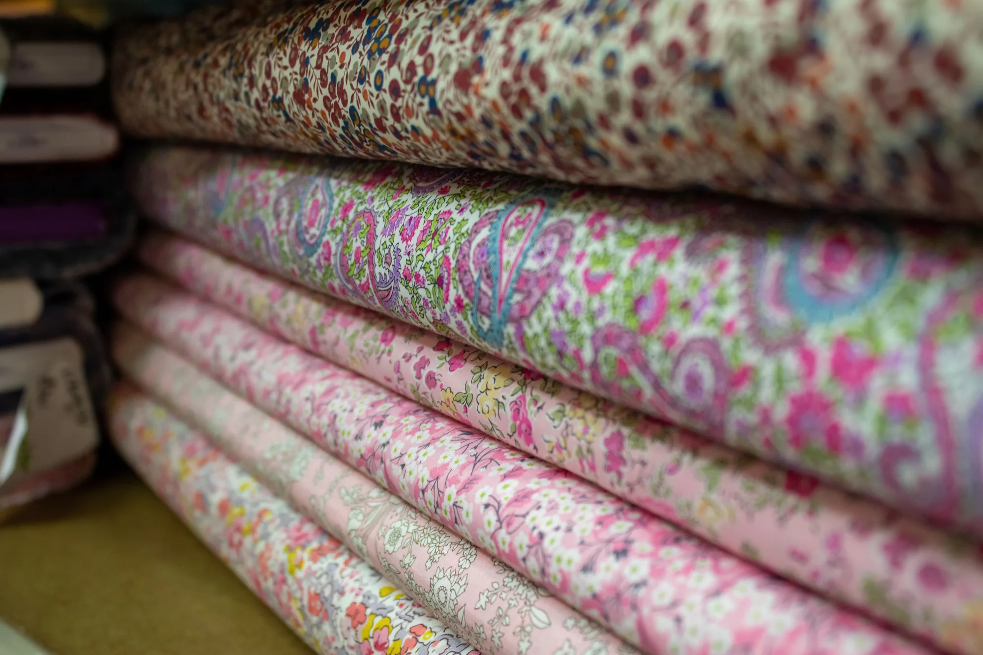 Rolls of printed cotton: floral and paisley